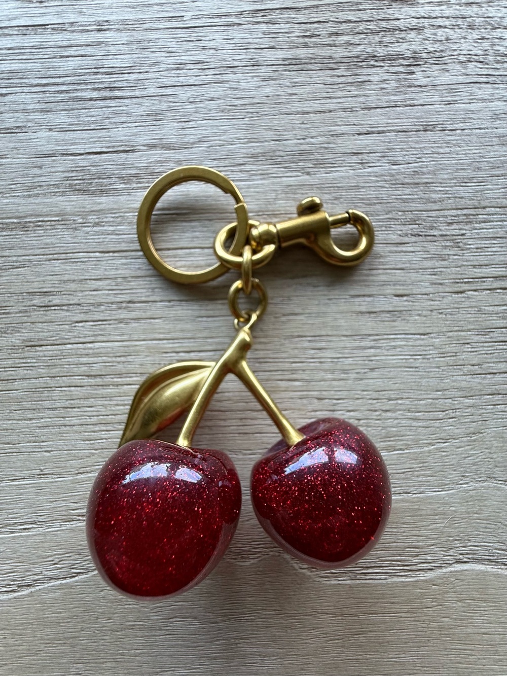 NWOT Gold Keychain Bag Charm with Red Glitter Cherries